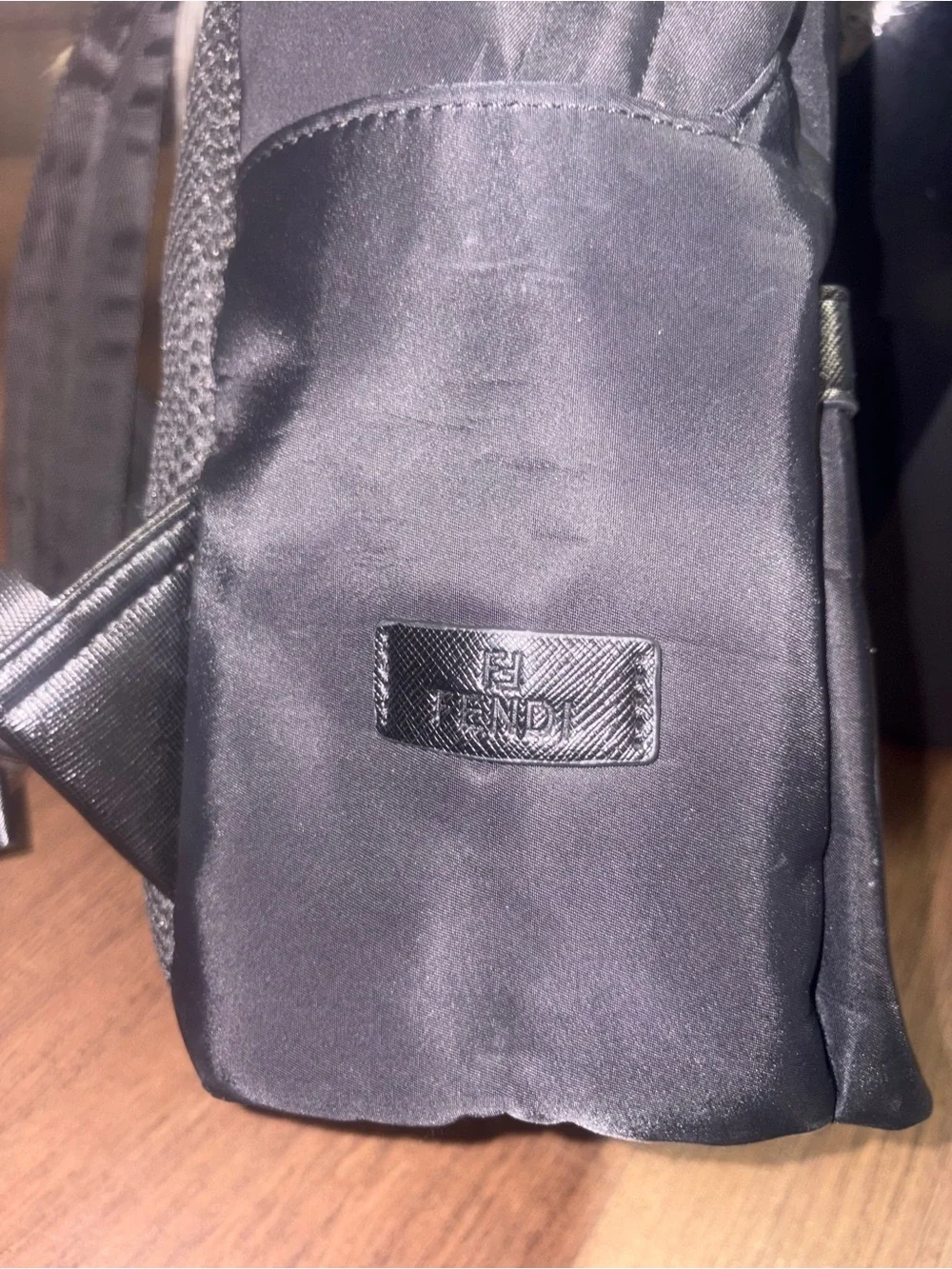 Black Men's Backpack with Blue Accent and Leopard Detail